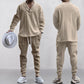 2-delat herrset bestående av en baggy sweatshirt med V-ringning och joggingbyxor