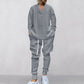 2-delat herrset bestående av en baggy sweatshirt med V-ringning och joggingbyxor