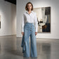 Asymmetriska omlottjeans 👖 Kombinera culottes och byxor, hög midja för att förlänga benen, vida och böljande, med diagonalt placerade knappar – förvandla dig omedelbart till en fashionista! ✨